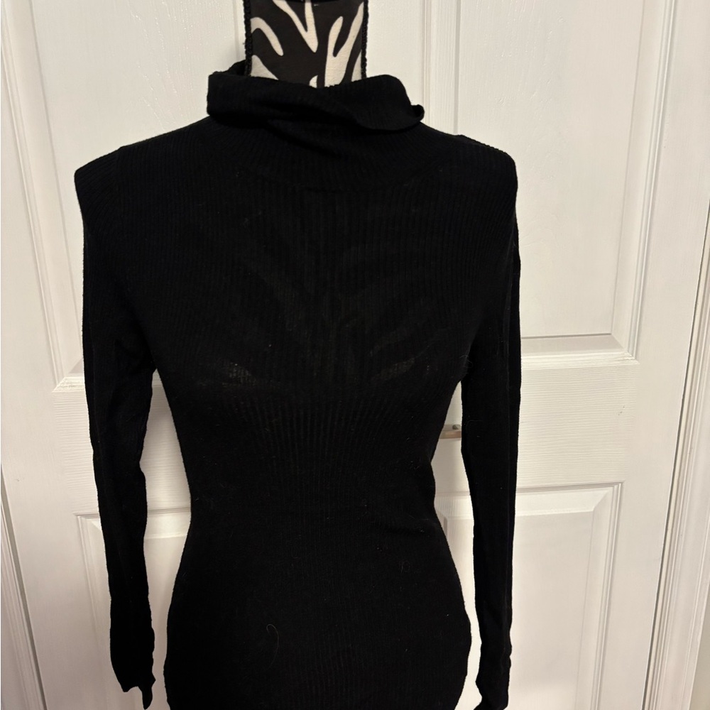 Women’s Ricki’s turtleneck. Small
